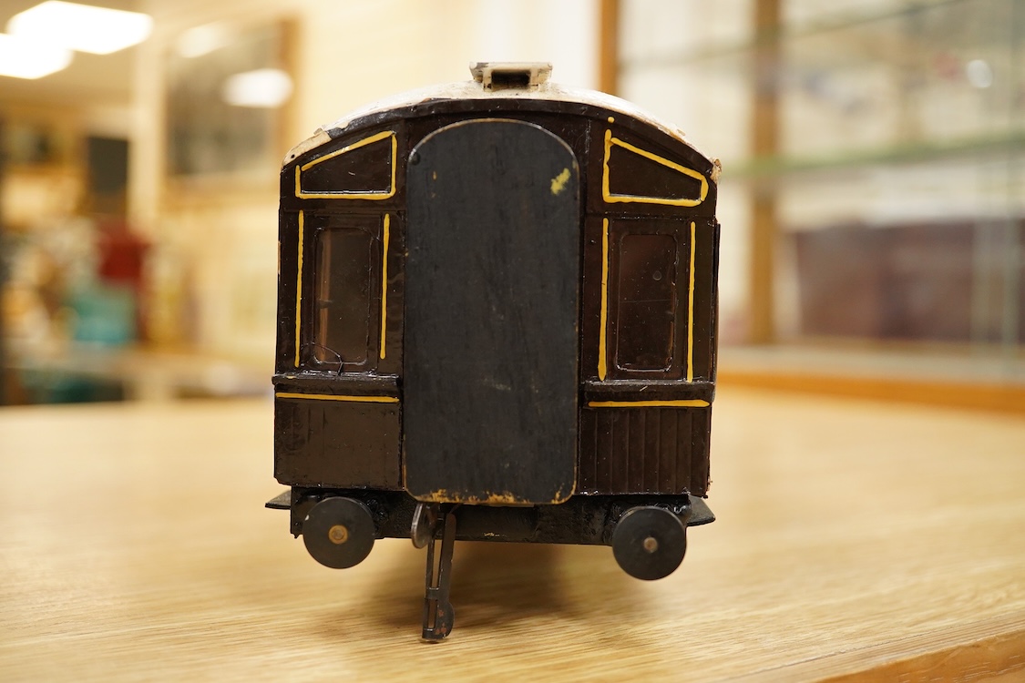 Two Gauge One bogie coaches; a Midland Railway clerestory coach, together with a 12-wheel Pullman car (bogies af), plus an American outline caboose, some scratch building and adaptation from kits, etc.